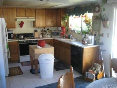 Spacious kitchen window to backyard