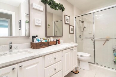 Full bath featuring a stall shower, tile patterned