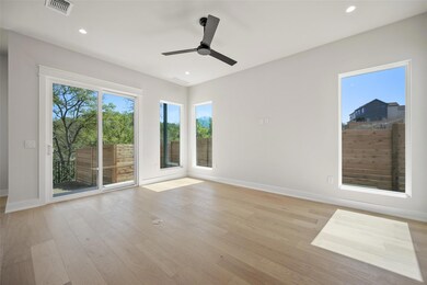 Unfurnished room with visible vents, recessed lig
