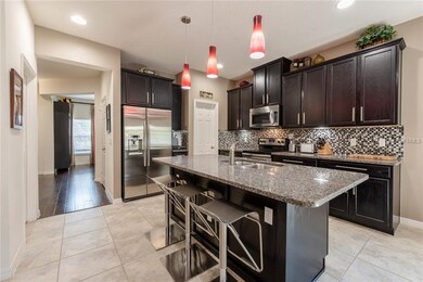 KITCHEN with STAINLESS STEEL APPLIANCES, GRANITE C