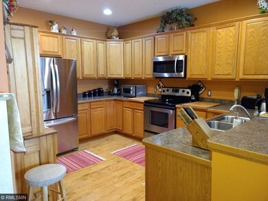 Beautiful Kitchen with hard wood floors and plenty