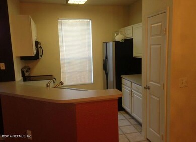 Kitchen with Appliances & Breakfast Bar