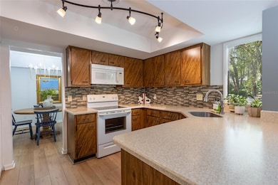 Beautifully Updated Kitchen With Solid Surface Counter