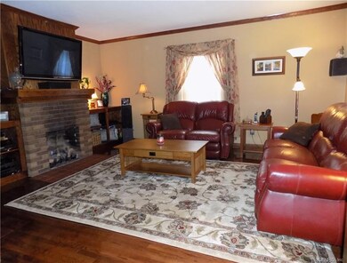 Living Room Has A Gas Vent Free Fireplace & Built 