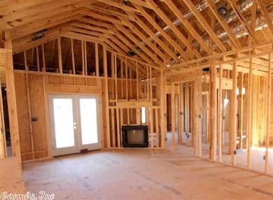 Vaulted ceilings with fireplace.