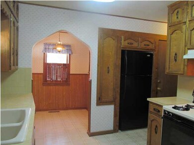 View of fully applianced kitchen and breakfast noo