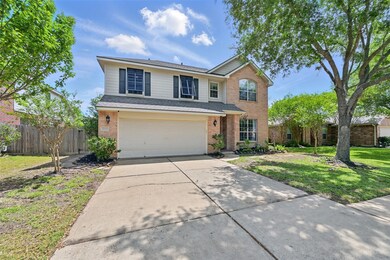 Spacious double-wide driveway offering plenty of p