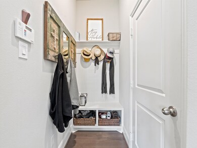 Mudroom hall is located just off of the garage.