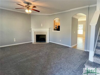 As you enter the main living area you see a tile e
