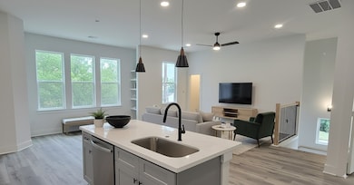 4922 HOOVER - UNIT F - Front corner home. Open concept living space on second floor with living room, dining and kitchen.