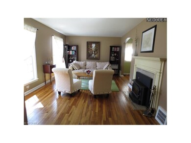 Living Room with Gorgeous Refinished Hardwood Floo