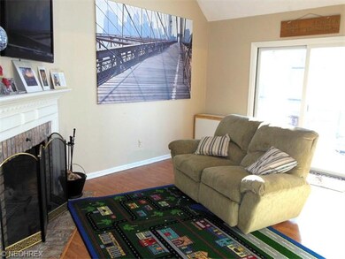 Family Rm w/ woodburning Fireplace.