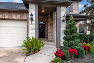 Fabulous curb appeal greet you as you walk up to the covered porch.