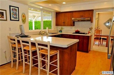 Kitchen with teak cabinetry