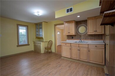 Another view of EAT-IN KITCHEN and dining area com