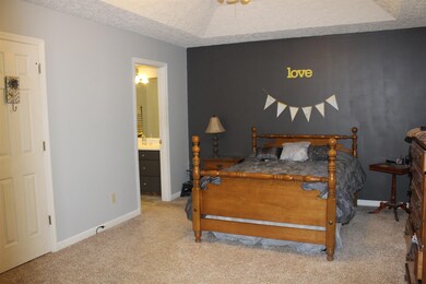 Master bedroom with his and hers walk in closet.