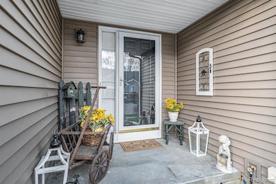 Property entrance featuring a patio