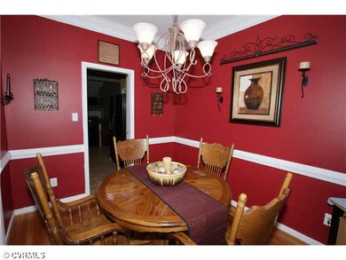 Dining Room - Dining area with crown molding, chai