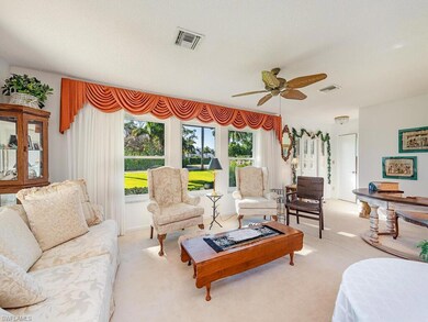 Original formal living room  with landscaped view 