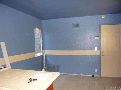 Breakfast/Eating area next to kitchen with door to