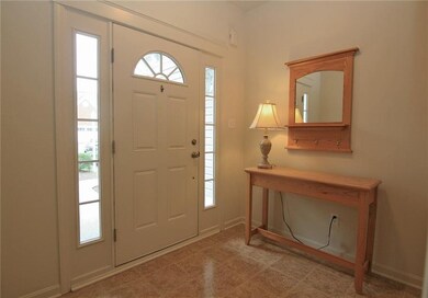 The entry door sidelights allow plenty of natural 