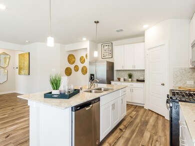 Photo is not of the actual home, but is an inspirational photo of builder’s model home and may depict options, furnishings, and/or decorator features that are not included