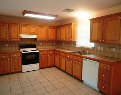 Kitchen. LARGE KITCHEN WITH OAK CABINETS, TILED FL
