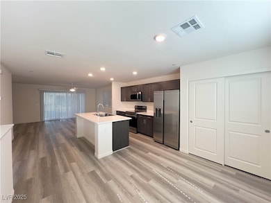 Kitchen with appliances with stainless steel finis