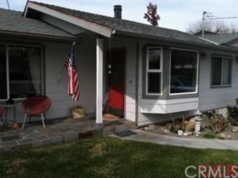 Built in window seat in entry of this home provide