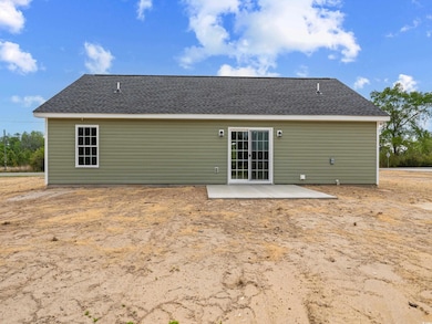 Back of property featuring a patio