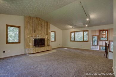 Upstairs LR W/Marble Tile Wood Fireplace