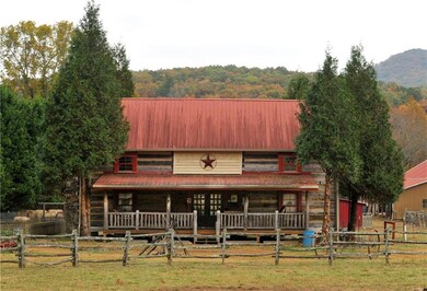 View of front of house featuring metal roof