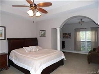 Master bedroom with sitting area and hidden office