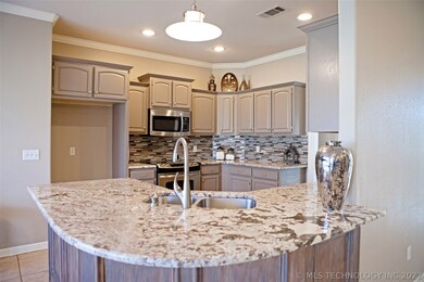 Upgraded granite and backsplash and stainless appl