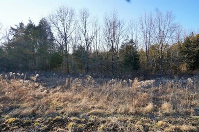 This wooded location is ideal for a home nestled i