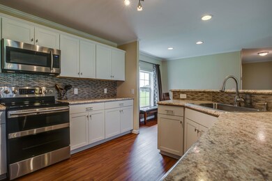 Totally renovated kitchen w/new s/s appliances, recessed lighting & laminate flooring.