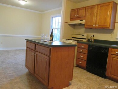 One view of your kitchen with a center island!