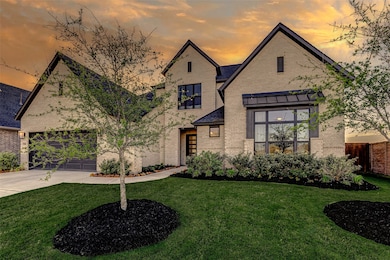 The home’s exterior showcases impeccable design, w
