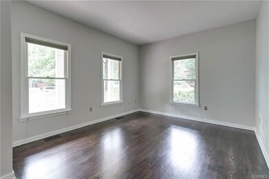 The Living Room boasts 3 windows, allowing for lot