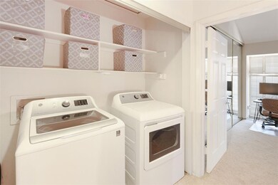 Laundry/utility area is on the top floor between t