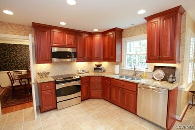 Gorgeous renovated kitchen with cherry cabinets, s