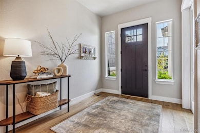 8890 S Quatar Ct, Aurora, CO 80016 - photo 2