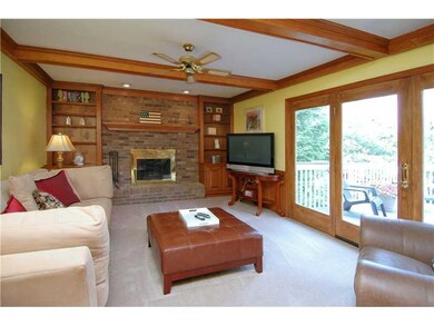 Family Room. Nice brick fireplace in family room w