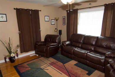 The Living Room has beautiful hardwood floors, pic