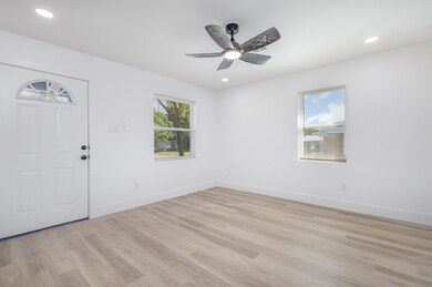 Foyer with light wood-style floors, recessed lighting, and a ceiling fan