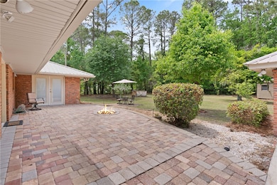 Relax on the patio overlooking private yard!