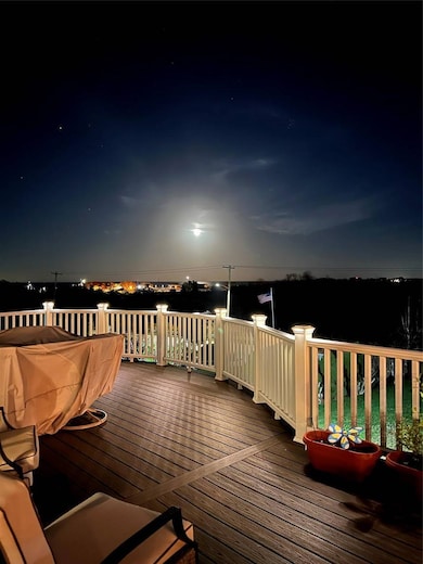 View of deck at night