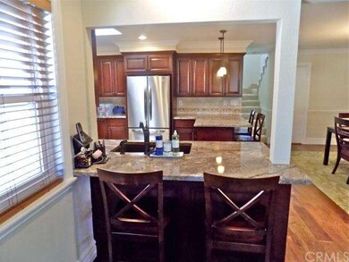 2 breakfast bars & stainless steel appliances