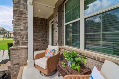 Enjoy the Sunny Front Porch Area