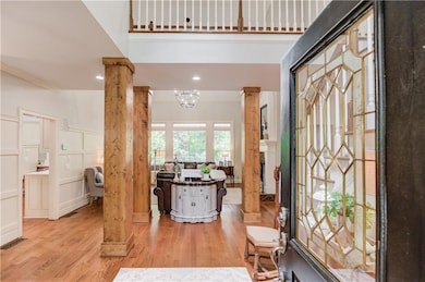 Foyer entry spectacular columns and hardwood floor